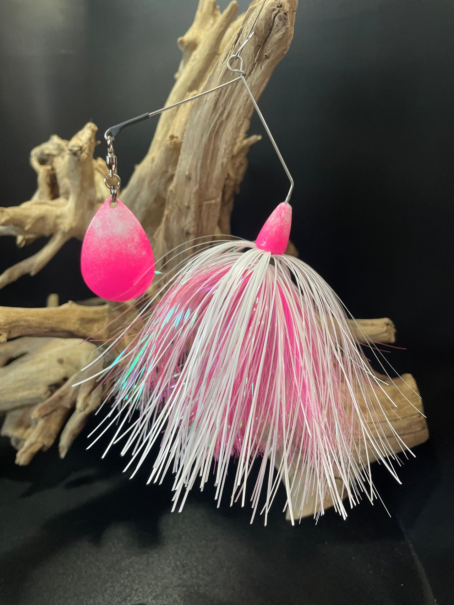 Expertly designed and crafted, the Bad Barbie is a top-of-the-line 1 oz spinnerbait fishing lure that guarantees an impressive catch. Its vibrant pink and white colours, paired with a #7 Colorado Blade and #7/0 hook, provide increased visibility and attraction to hungry muskies and Pike. Elevate your fishing game with the unbeatable performance of the Bad Barbie.