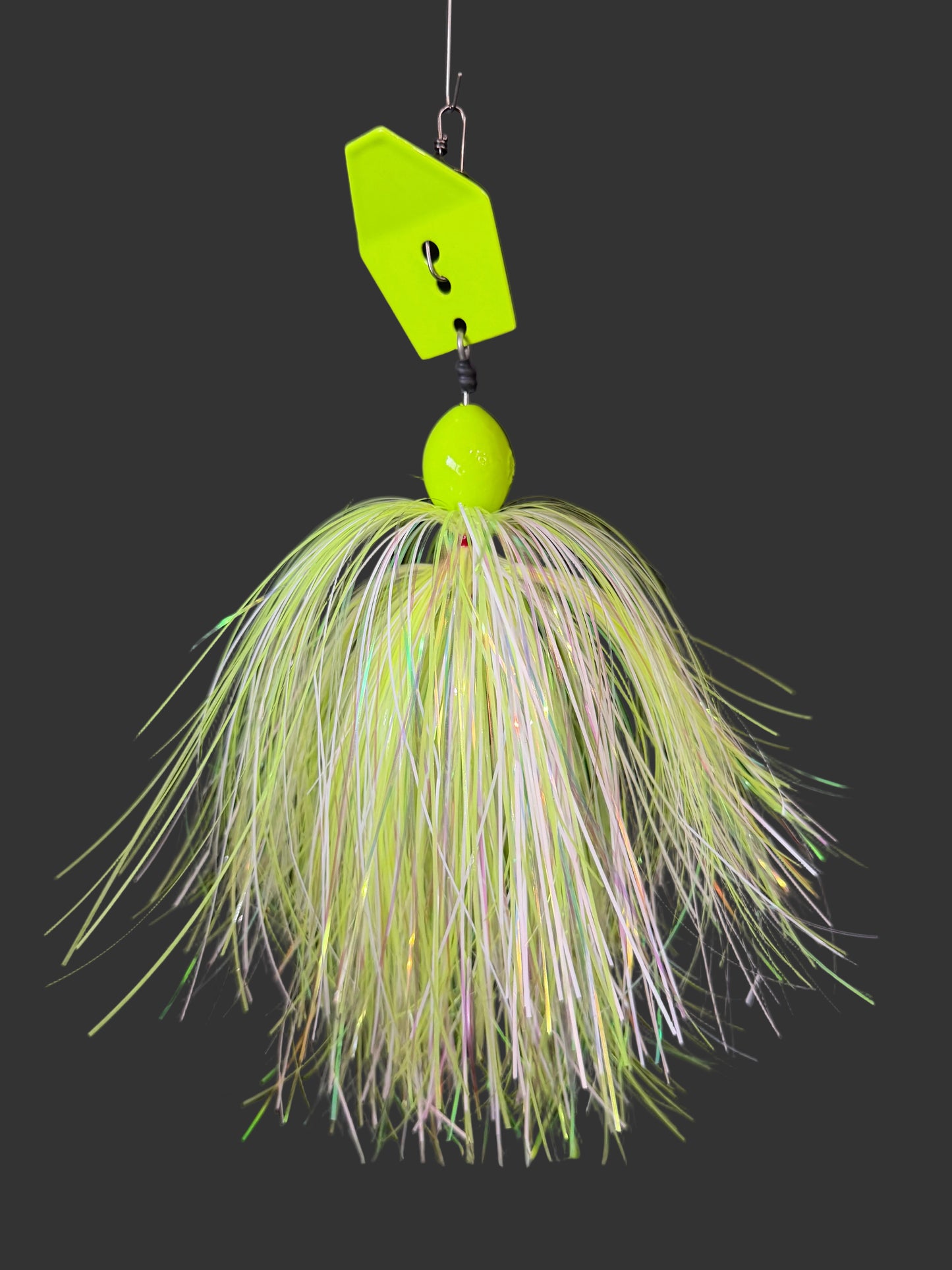 a heavy duty Muskie Chatterbait with a chartreuse blade and a yellow glow and pearl white skirt, offered in 1oz-3oz. Lure-cifer made in Brantford, Ontario Canada
