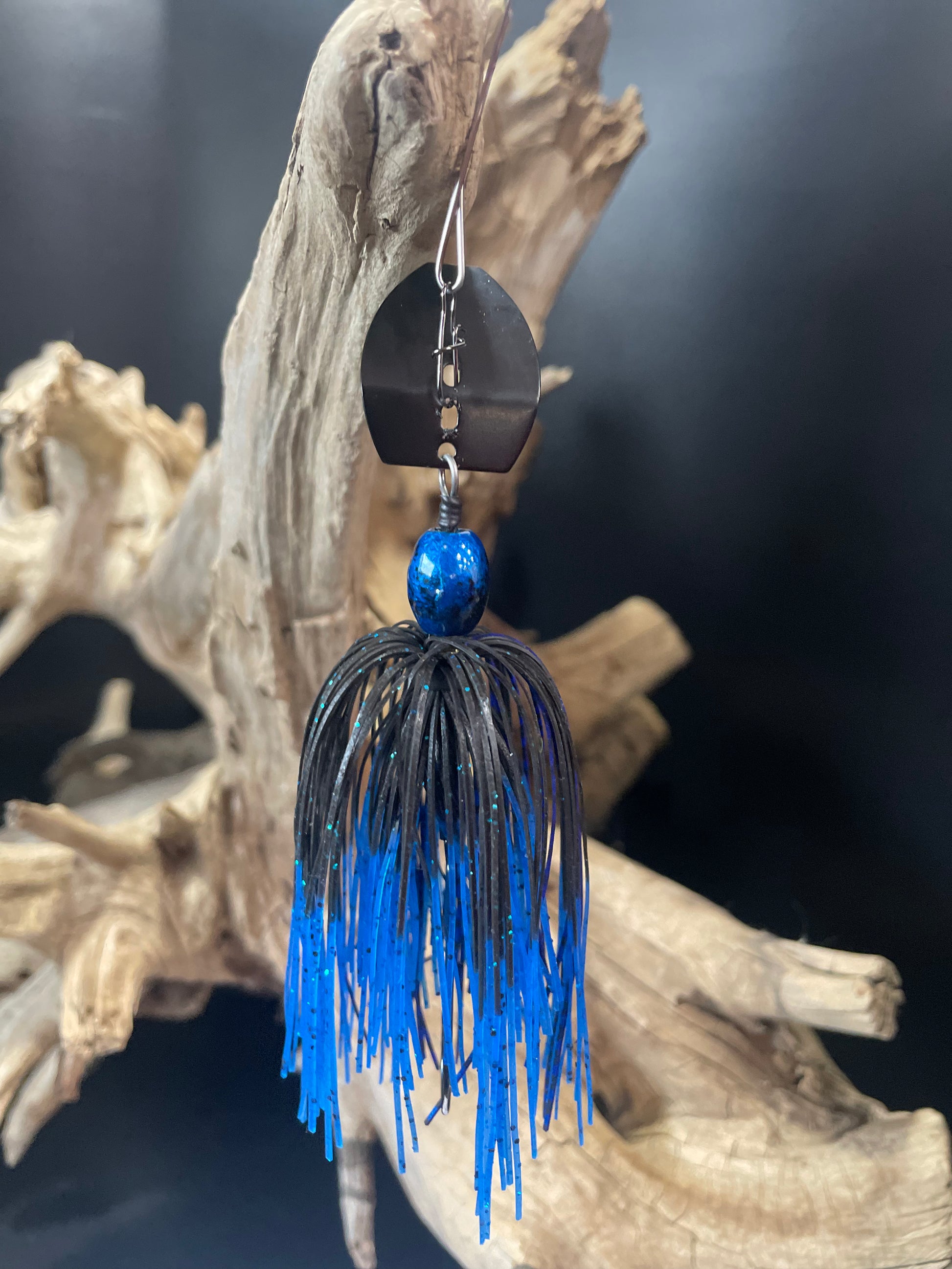 the 3/8 oz Black and Blue Bass Chatterbait fishing lure. Featuring a #4/0 hook and your choice of a Black or Silver Blade, this premium lure is designed for optimal performance and versatility. Improve your catch rate with Midnight Shade. Lure-cifer Brantford, Ontario Canada.