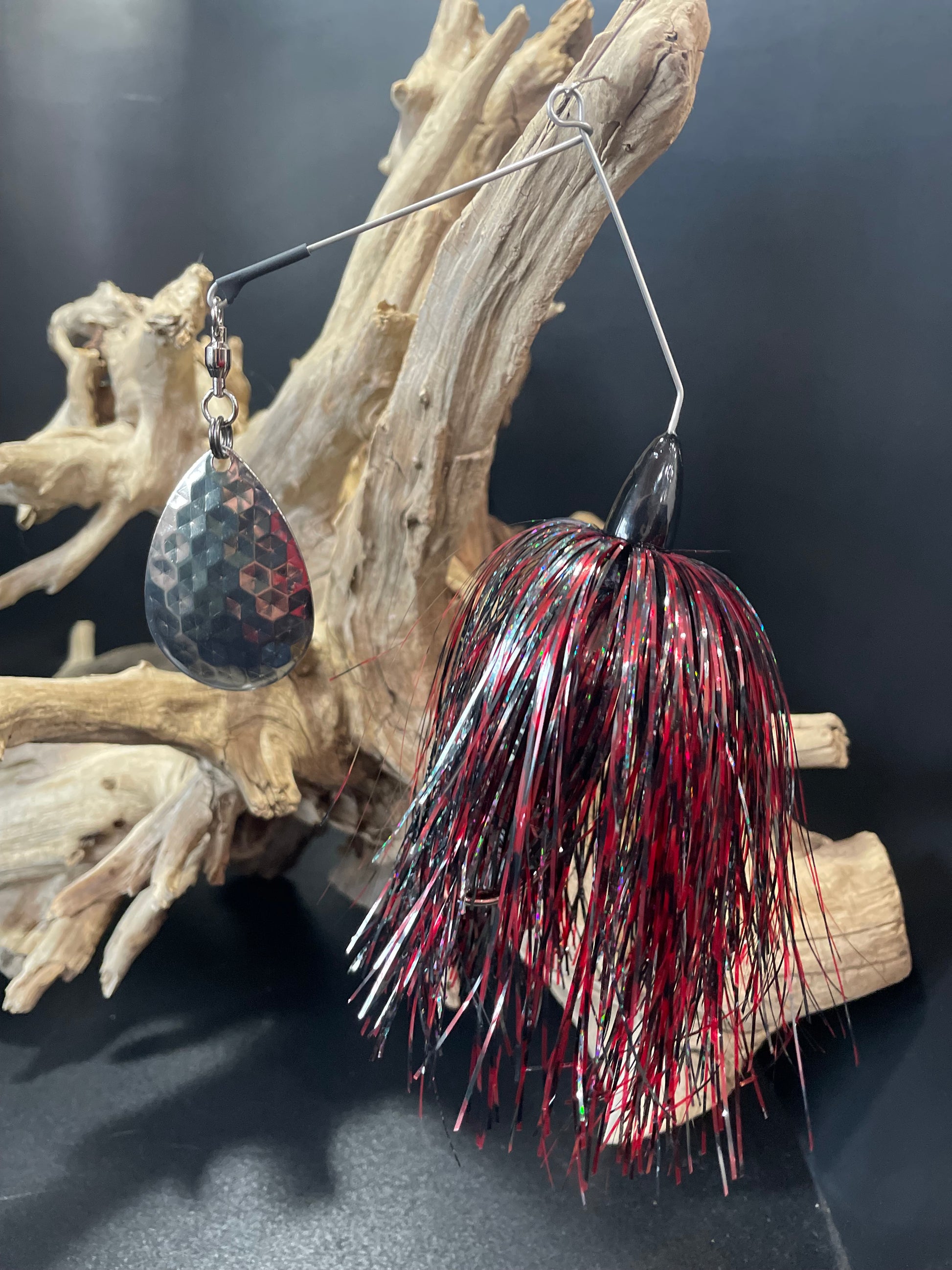 Discover the ultimate fishing lure with The Red Wedding - a powerful combination of a red and black Muskie/Pike spinnerbait fishing lure, a #7 Colorado Hex Blade, and a 1 oz weight with a #7/0 hook. Designed for maximum effectiveness and durability, this expertly crafted lure will give you the edge you need to reel in the catch of a lifetime. Pro-Tec clear blades for durability and to prevent corrosion.