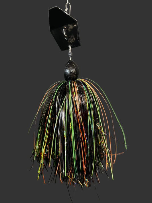 Muskie chatterbait with a black blade and a fire tiger skirt that is black, orange and chartreuse. Made by Lure-cifer in Brantford, Ontario, Canada.