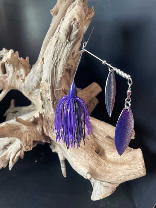 Purple and Black bass spinnerbait fishing lure. Pictured on driftwood. 3/8oz with #4.5 and #5 willow blades. 