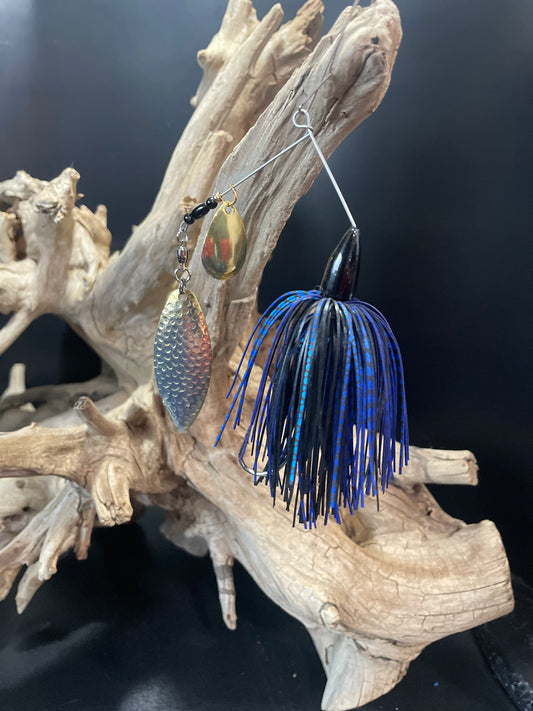 Black and Blue bass spinnerbait. It features a #5 Willow blade and a #4/0 hook, providing optimal performance for catching fish. At 3/8 oz,