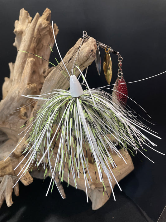 The ultimate bass spinnerbait fishing lure. Catch more fish with its triple willow blades and #5/0 hook, available in 1/2 oz and 3/4 oz. Its sleek design in white, black, and chartreuse guarantees success on every fishing trip.