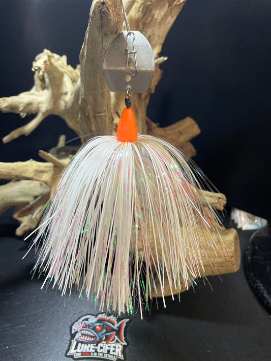 Experience exceptional fishing with Glacier Glow, a 1 oz Chatterbait featuring a white and pearl orange design. The #7/0 hook paired with a glow orange head and UV glow blade guarantees a successful catch. Expertly crafted for maximum performance. picture without he blade glowing