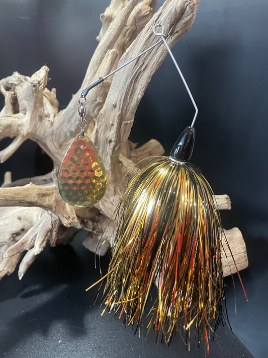 Expertly designed for success, the Muskie/Pike Spinnerbait fishing lure delivers results. The 1oz head and #8 Hex Blade provide maximum lure control, while the sleek black and gold colour combination is sure to attract even the most elusive muskie. Trust in this spinnerbait for your next fishing excursion. Pro-Tec clear blades for durability and to prevent corrosion.