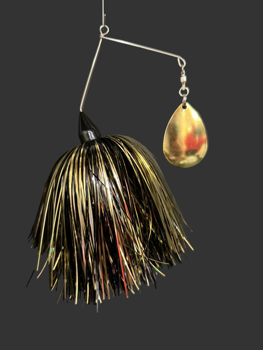 Muskie/Pike Spinnerbait with a gold and black skirt and a gold coloado blade. made by Lure-cifer