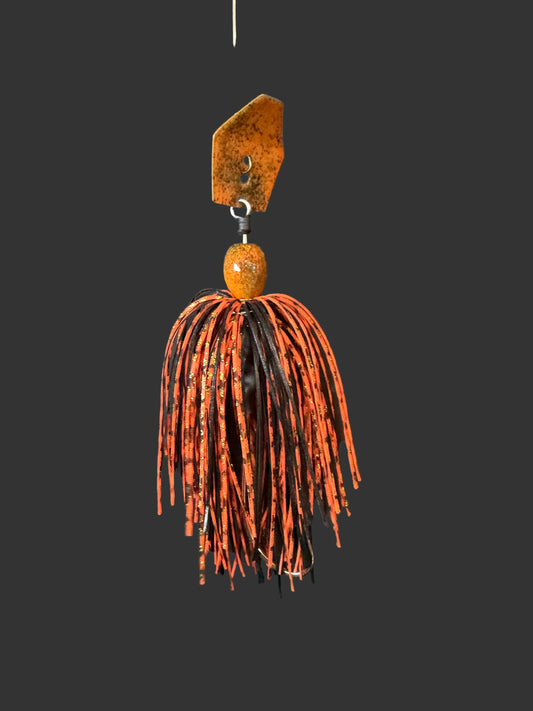 Expertly designed for optimal fishing, our Jack'd Up Black and Orange Bass Chatterbait fishing lure offers top-of-the-line features. With a 3/8 oz weight and a #4/0 hook, this bait provides precision and versatility. Choose between a Black or Silver blade for maximum customization.