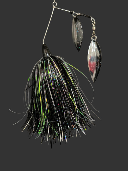Fishing lure with black and green details on a gray background
