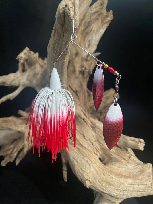 Red & white 3/8 oz spinnerbait with UV glow blades and a #3/0 hook. Built for visibility, strength, and serious strikes. Made to perform in all waters. pic 1