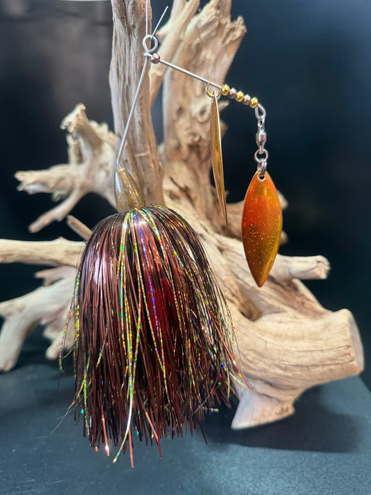 Penny Demon Muskie Spinnerbait with a bronze and gold skirt with dual copper willow blades
