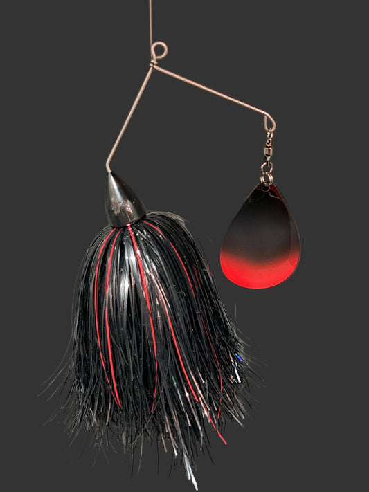 A red, black and Silver Muskie Spinnerbait