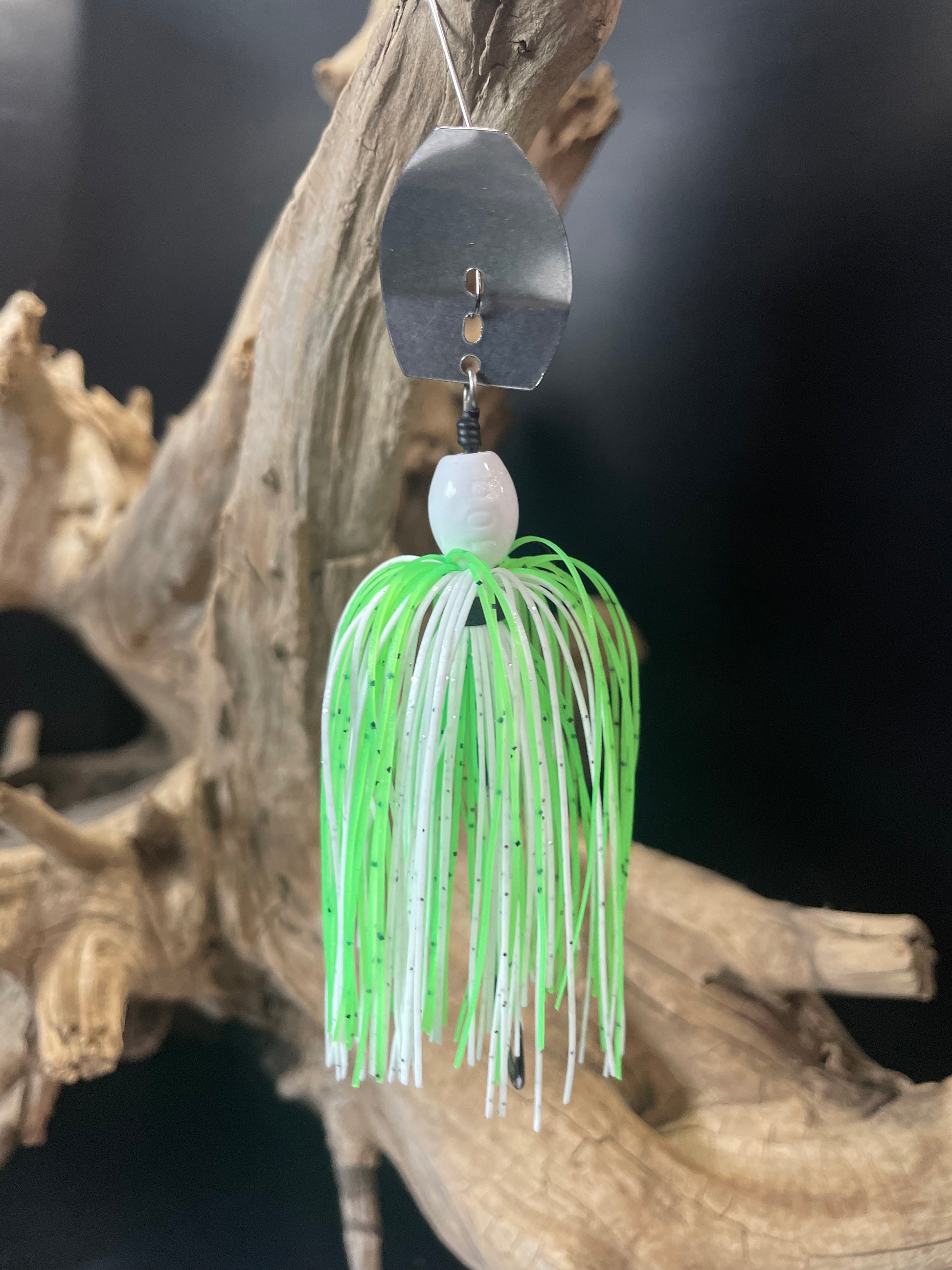 Slimer is perfect for catching bass with its unique combination of white and lime colouring. Featuring a 3/8 oz Bass Chatterbait fishing lure with a #3/0 hook and your choice of a black or silver blade, this lure is scientifically designed for maximum effectiveness.