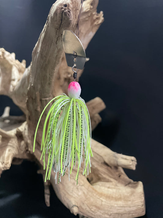 The Spite Flicker is a versatile Chatterbait that combines a white, chartreuse, and black stripe design with a 3/8 oz weight and #4/0 hook for maximum effectiveness. Choose between a silver or black blade, and catch more fish.