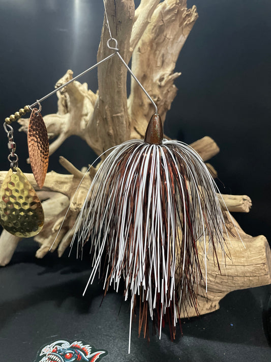 Experience the power of The Redeemer, crafted with a white and copper 1 1/2 oz. #8 Hex Colorado Blade, #5 copper hammered Willow Blade, and #7/0 hook. Its .062 wire and snap on ring offer unparalleled strength and versatility. Unlock the potential of your fishing with The Redeemer. For Muskie or Pike