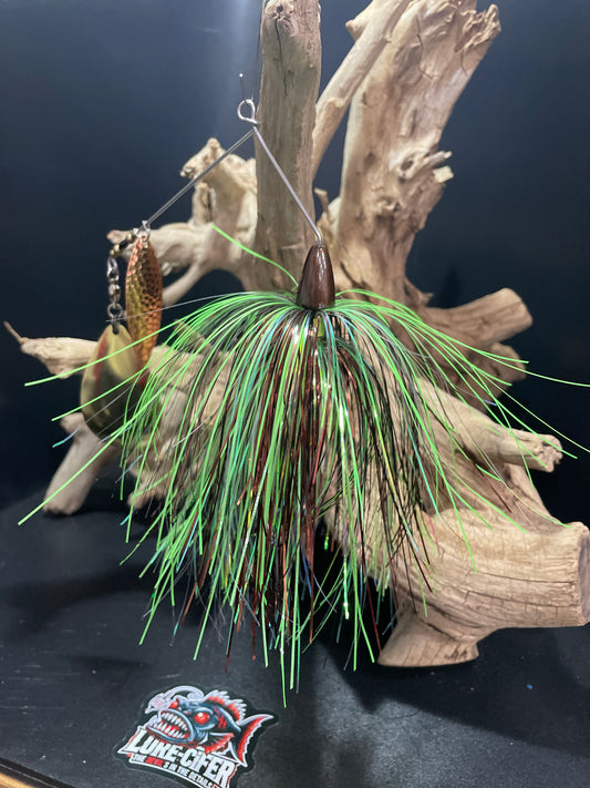 Expertly designed with a #7/0 hook on a snap ring and .062 wire, Toxic Haze boasts a glow green and copper finish paired with a #8 Hex Colorado Blade and a #5 Copper hammered Willow Blade. This 1 1/2 oz Spinnerbait offers unmatched durability and irresistible appeal for the avid angler. Great Fishing Lures for Muskie/Musky and Pike