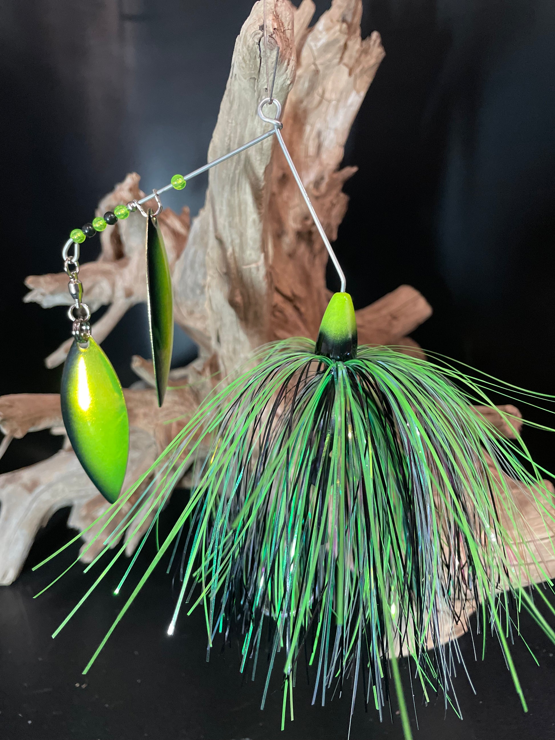 Black and Chartreuse Muskie Spinnerbait fishing lure. Designed for maximum thump and vibration to attract trophy fish in low light or murky water