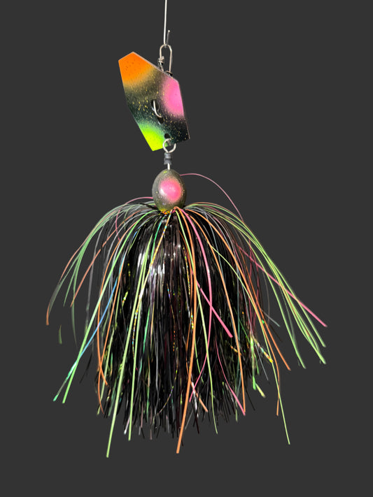 Muskie chatterbait with a black, orange, pink and chartreuse blade and skirt. made by Lure-cifer in Brantford, Ontario, Canada