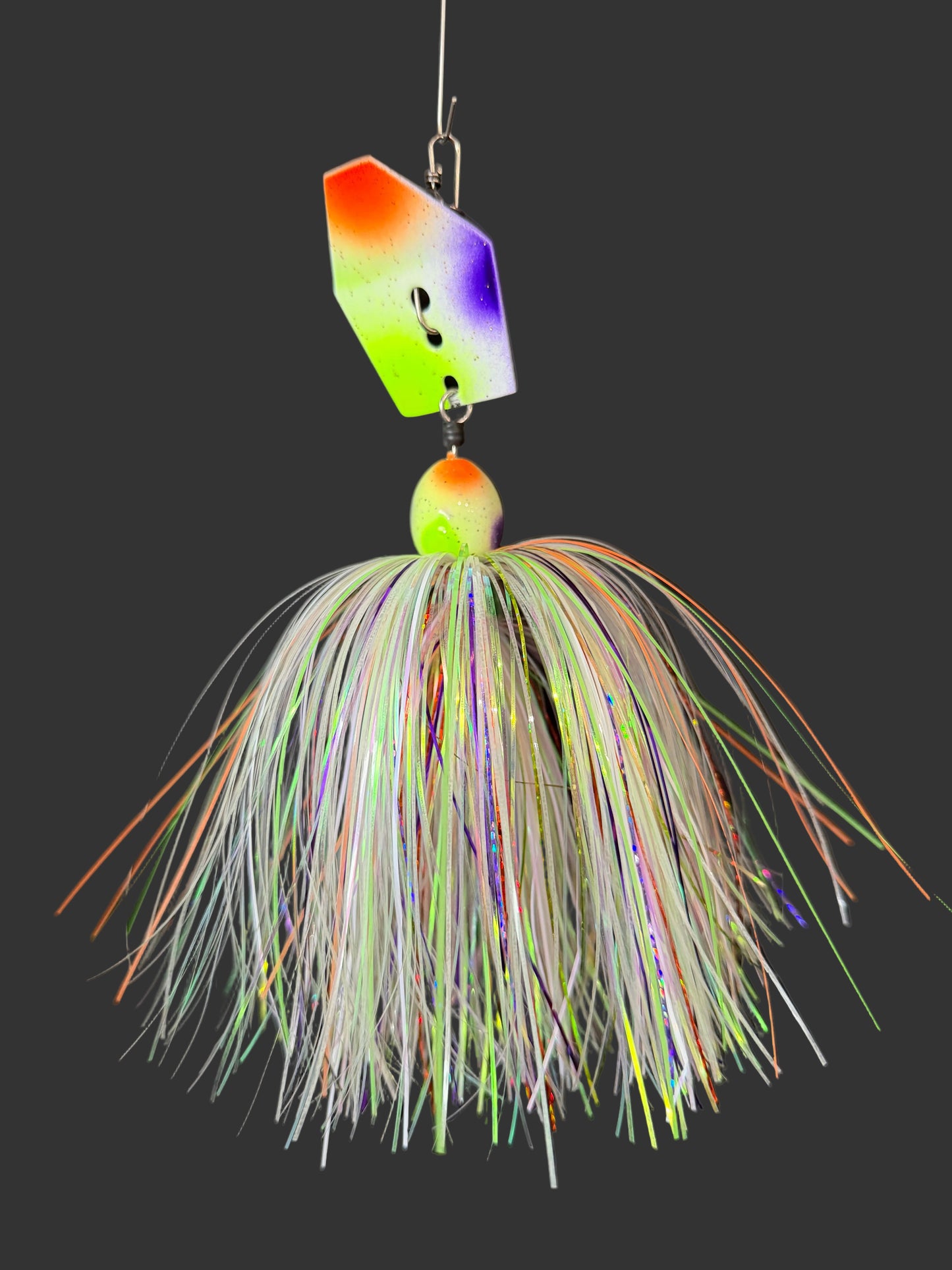 Muskie chatterbait with a Glow white, orange, purple, and chartreuse skirt and blade. Made by Lure-cifer in Brantford, Ontario Canada